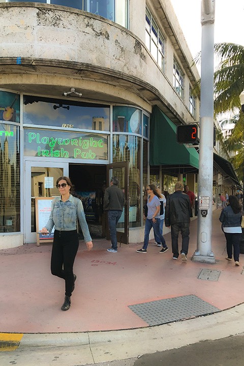 Playwright Irish Pub opens to South Beach street corner with chamfered entry below circular Art Deco building corner